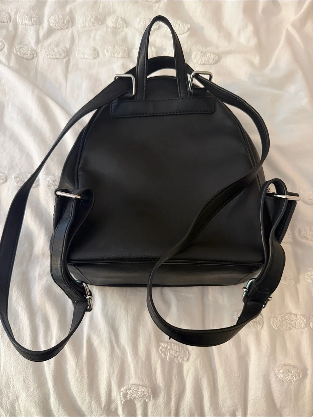 GUESS Black Quilted Mini Backpack with Silver-Tone Lock